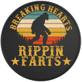 BREAKING HEARTS RIPPING FARTS SASQUATCH BLACK TIRE COVER