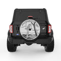 PARROT ON A SWING BLACK TIRE COVER