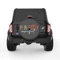 PERFECTLY IMPERFECT BLACK CARBON FIBER TIRE COVER