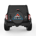STAY WILD BLACK TIRE COVER