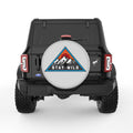 STAY WILD SILVER CARBON FIBER TIRE COVER
