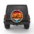 SUNSET MOUNTAINS SILVER CARBON FIBER TIRE COVER